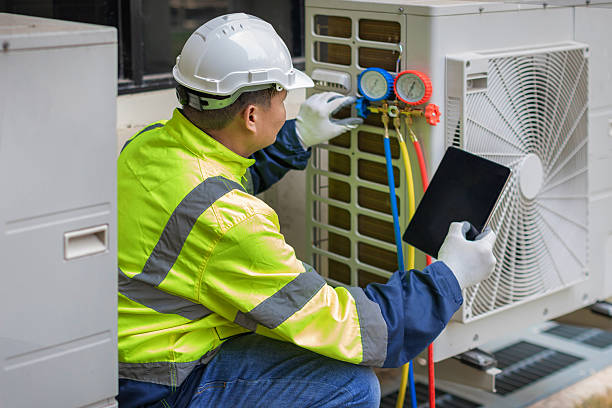 Professional Heat Pump Repair technician working in Blooming Grove, TX